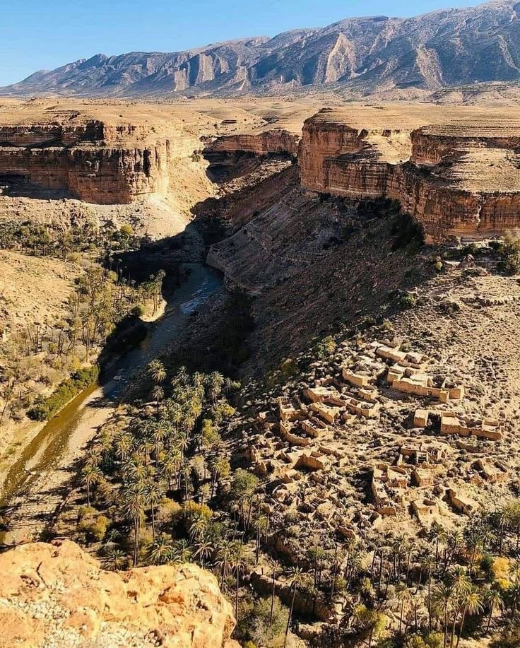 The Ghoufi canyon in the Aurès, abandoned cliff villages above a ribbon of palms