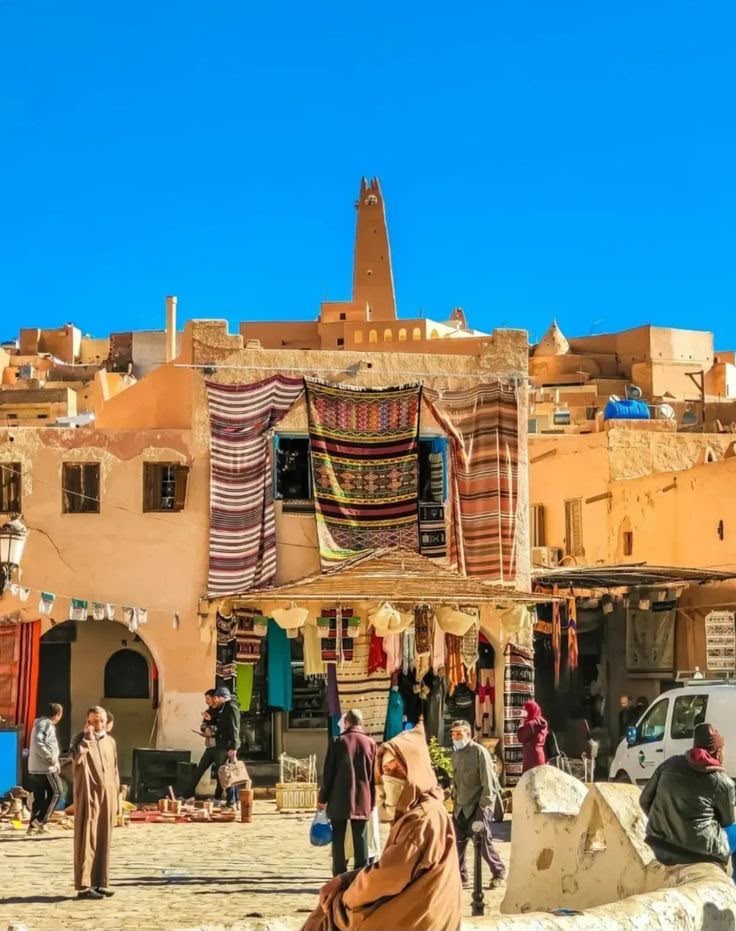The arcaded market square of Ghardaïa with hanging carpets