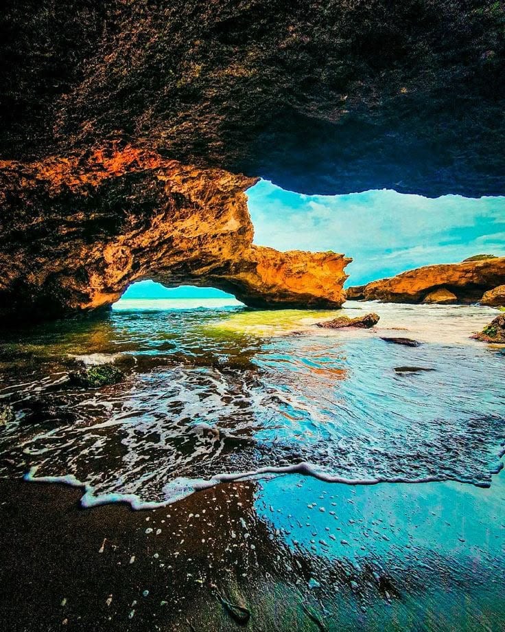Sea grotto and rock arch on the Mediterranean coast at Mostaganem