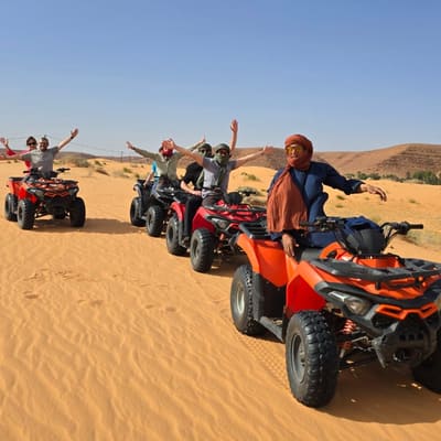Travellers on quad bikes among the dunes near Ghardaïa