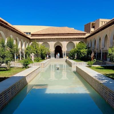The long tiled reflecting pool in the courtyard of the restored royal palace at Tlemcen