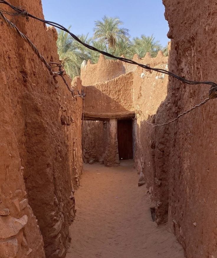 Red earthen alley in a ksar of the Gourara, Timimoun