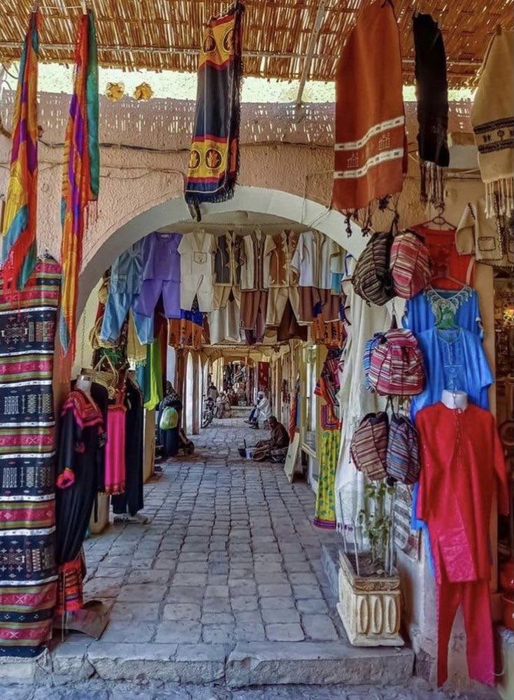 Colourful carpets and textiles in the Ghardaïa market, M Zab