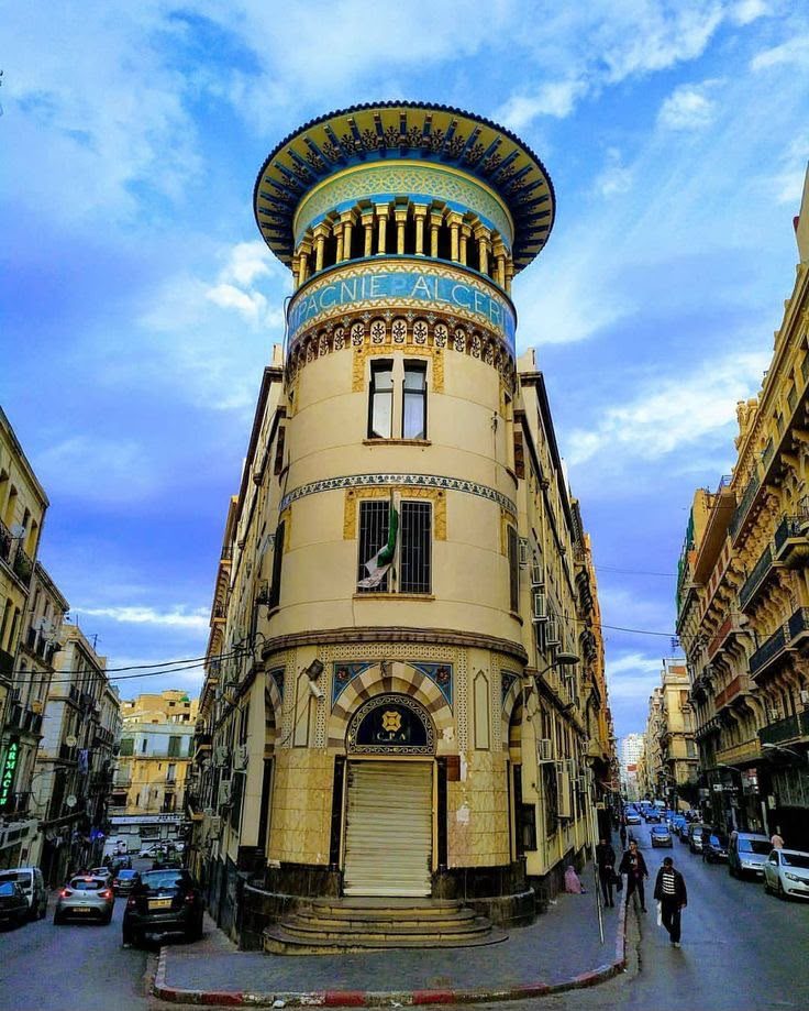 Distinctive striped neo-Moorish tower building in Oran