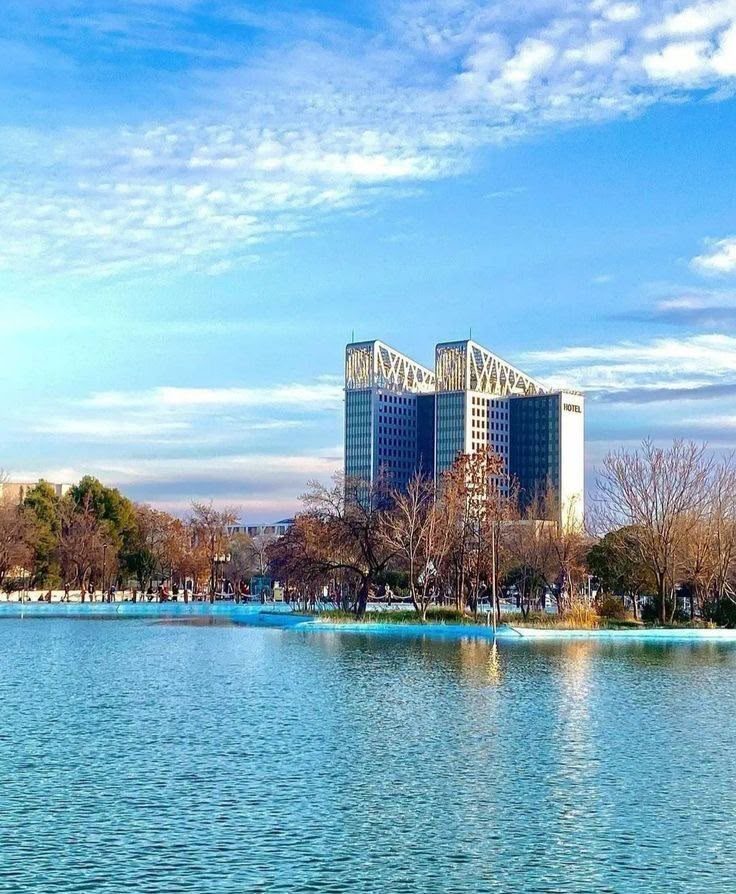 Park lake and modern architecture in Sétif, Algeria
